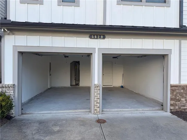 a front view of a house with yard