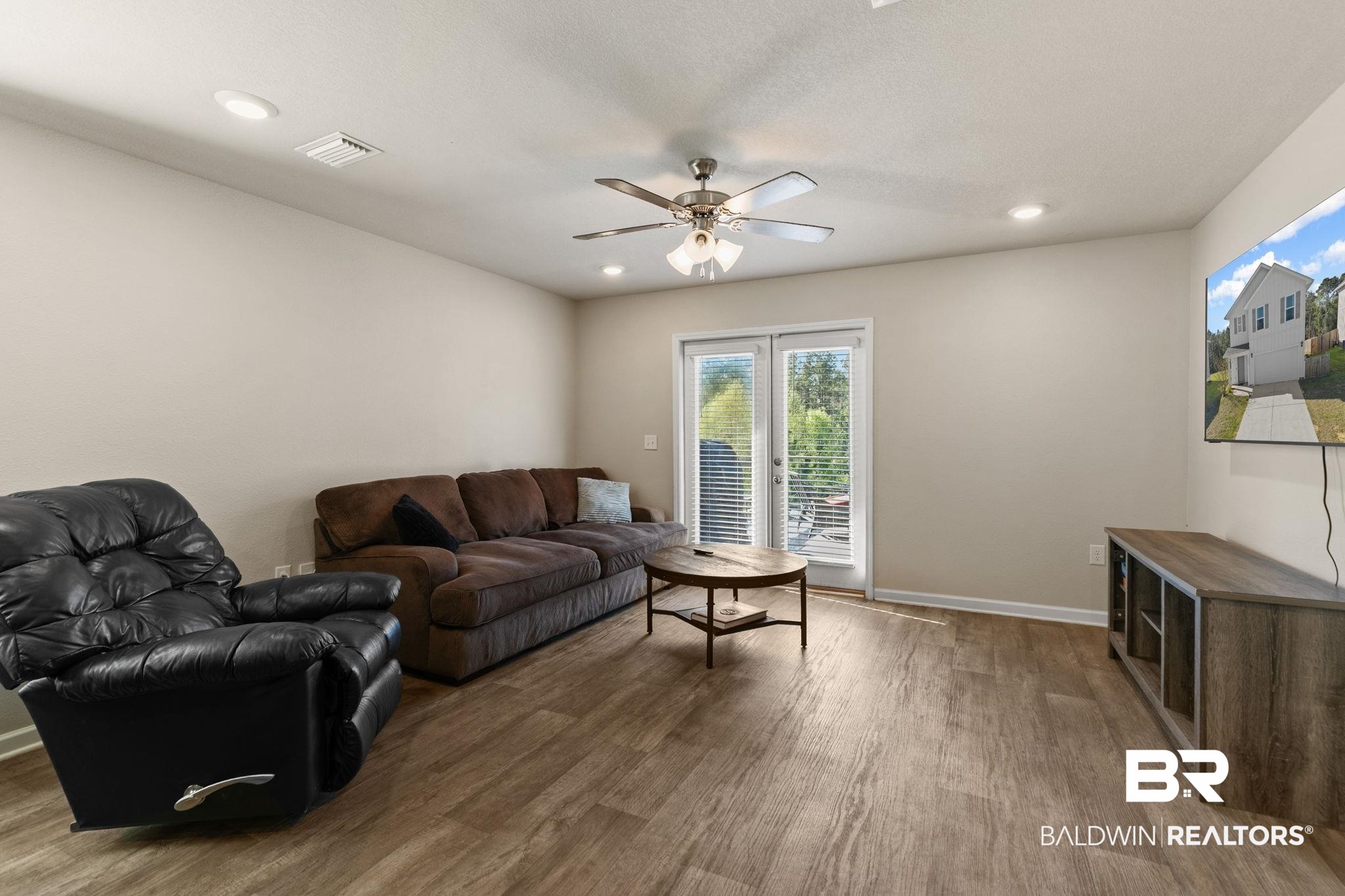 32234 Calder Court Daphne, AL 36527 - Photo 3 of 32 Living area with ceiling fan, wood finished floors, recessed lighting, and french doors