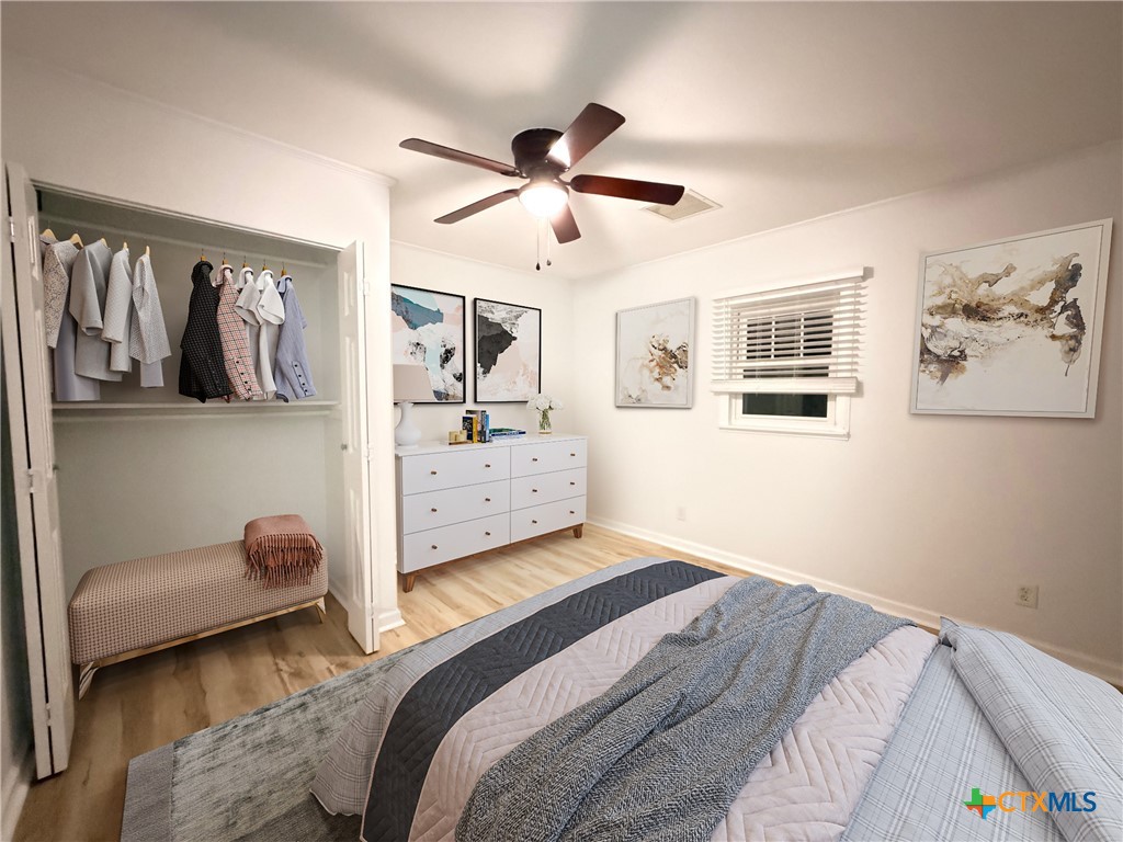 425 Woodland Point Road Belton, TX 76513 - Photo 23 of 27 a bedroom with a bed and a window