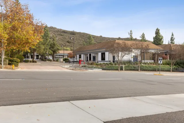 a view of multiple houses with a street