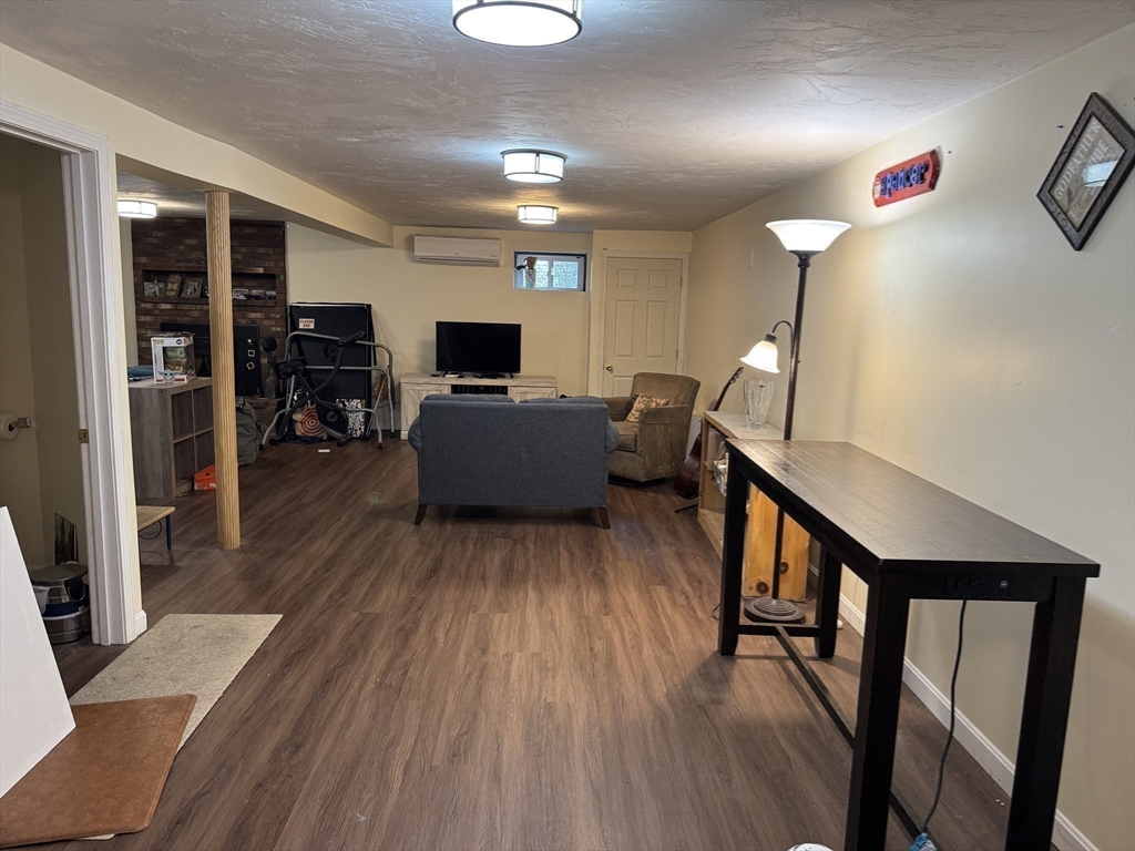 77 Branch Road East Bridgewater, MA 02333 - Photo 13 of 16 a living room with furniture and a flat screen tv