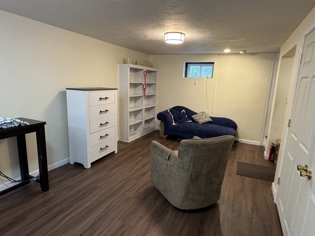 77 Branch Road East Bridgewater, MA 02333 - Photo 15 of 16 a living room with furniture and a wooden floor