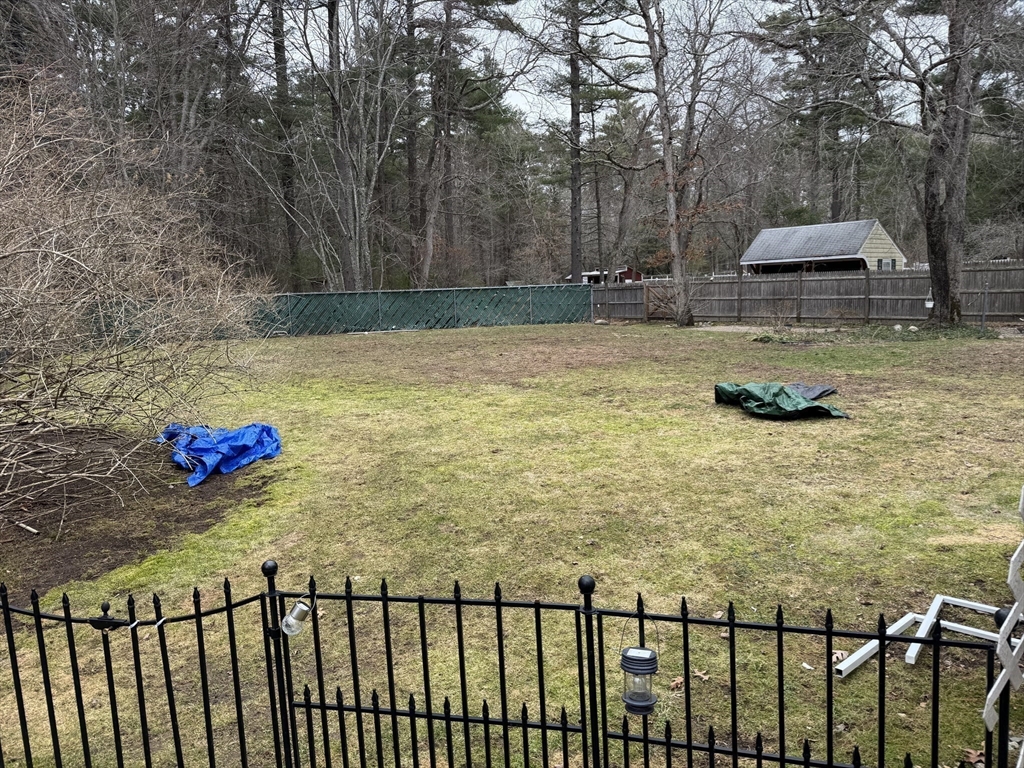 77 Branch Road East Bridgewater, MA 02333 - Photo 4 of 16 a view of a swimming pool with a backyard