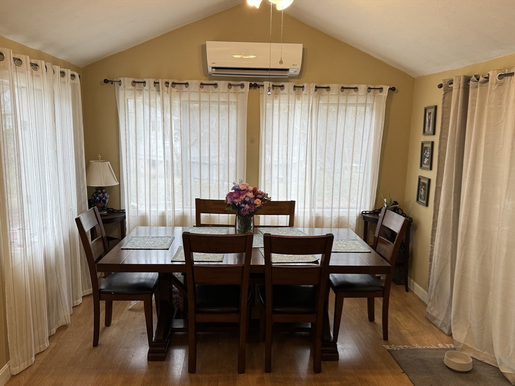 77 Branch Road East Bridgewater, MA 02333 - Photo 9 of 16 a view of a dining room with furniture and window