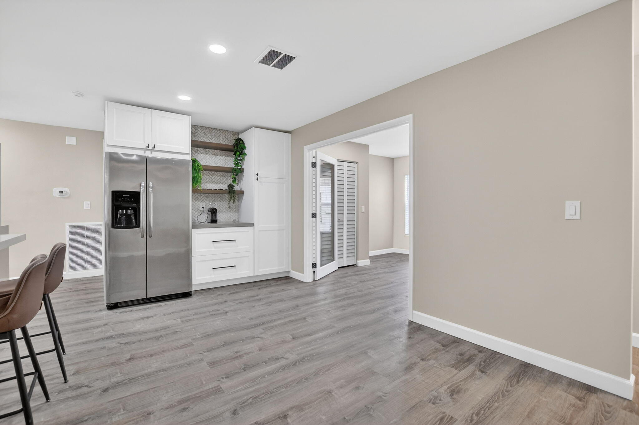 3068 Northwest 25th Way Boca Raton, FL 33434 - Photo 13 of 32 Kitchen into Dining Family into 4th Bedr