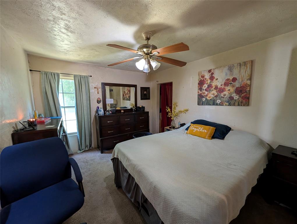 308 Short Street Mansfield, TX 76063 - Photo 10 of 21 a living room with furniture and a chandelier