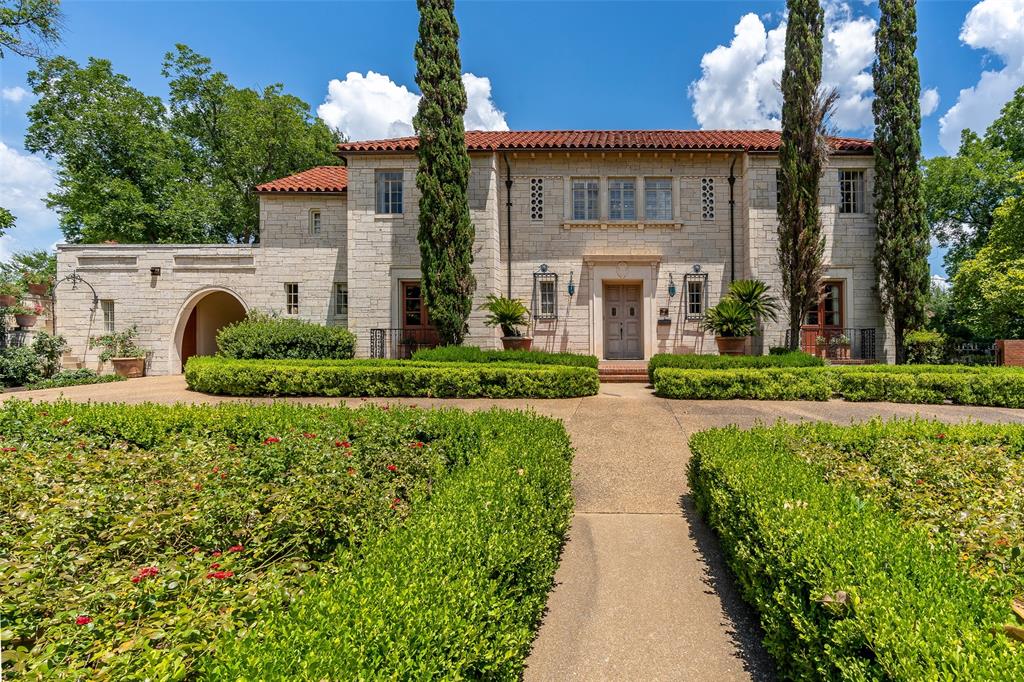 802 North Sixth Street Longview, TX 75601 - Photo 1 of 1 a front view of a house with a yard and potted plants