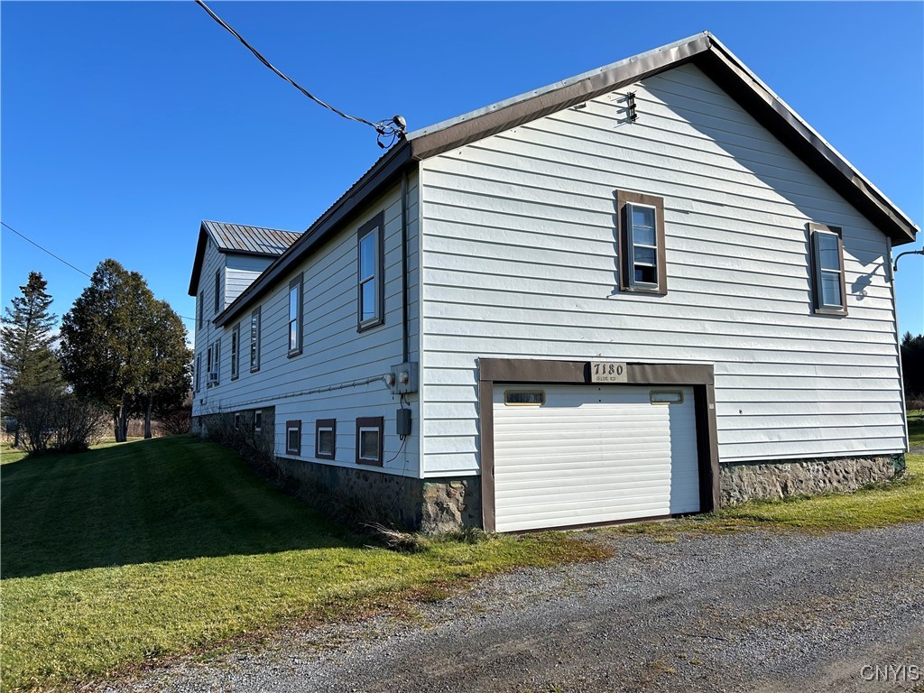 7180 Glur Road Rome, NY 13440 - Photo 6 of 49 overhead door to basement under 1 story unit