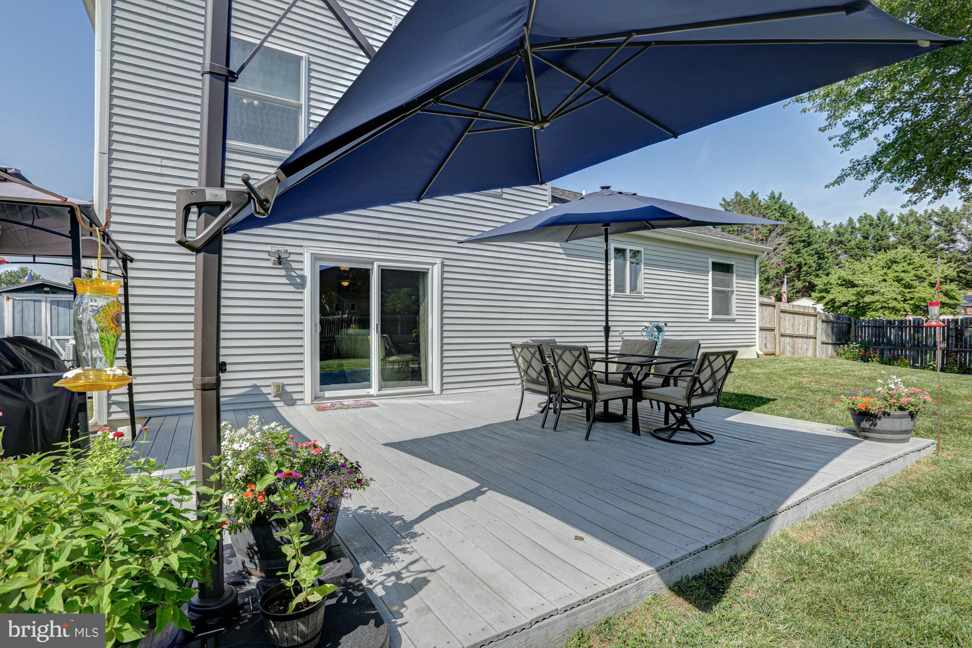 6 3 Rivers Drive Newark, DE 19702 - Photo 14 of 63 Sunny patio retreat with shaded seating.