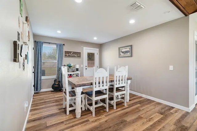 a view of a dining room with furniture