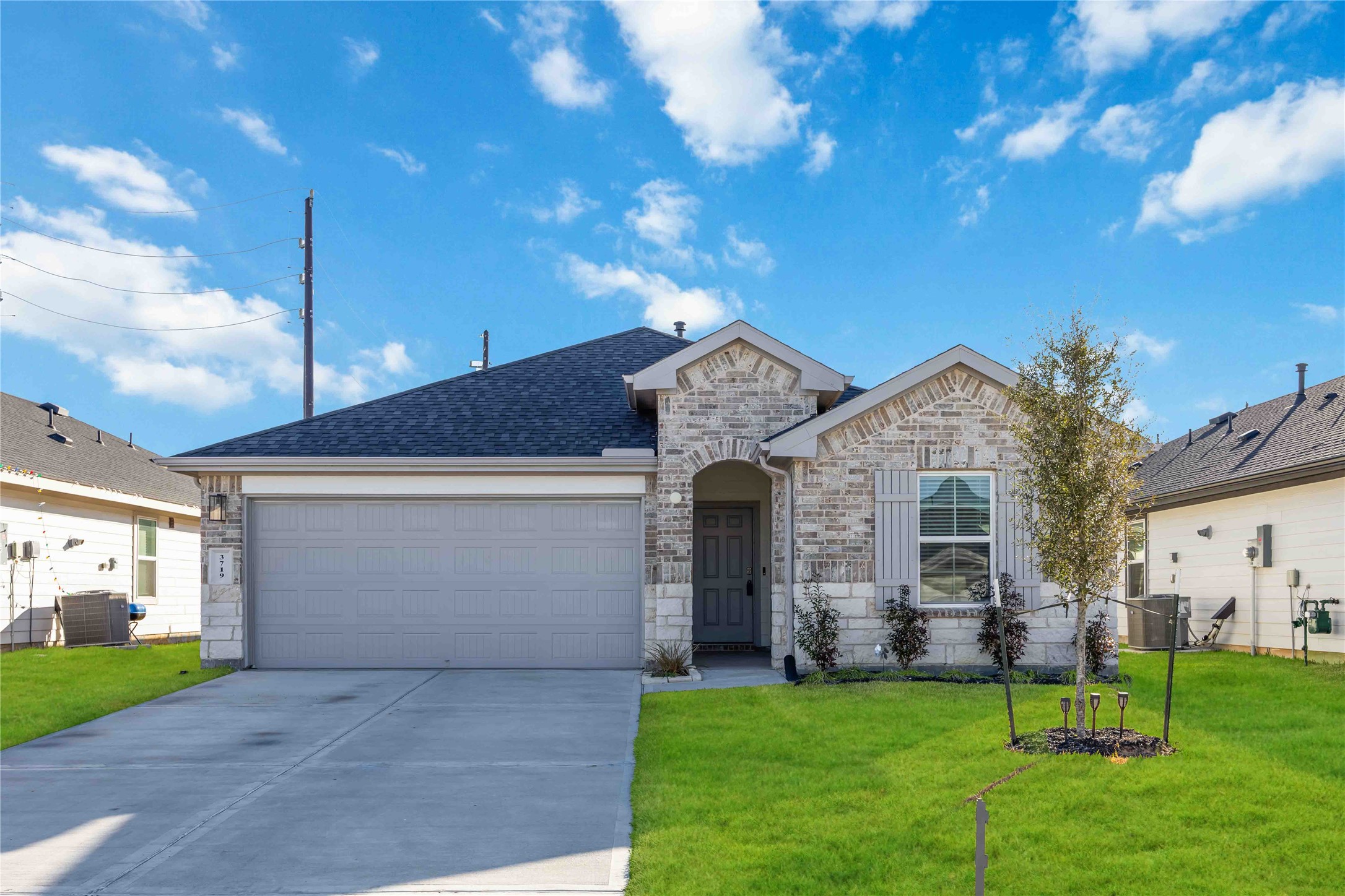 3719 Lanercost Lane Fulshear, TX 77441 - Photo 1 of 43 a front view of house with a garden