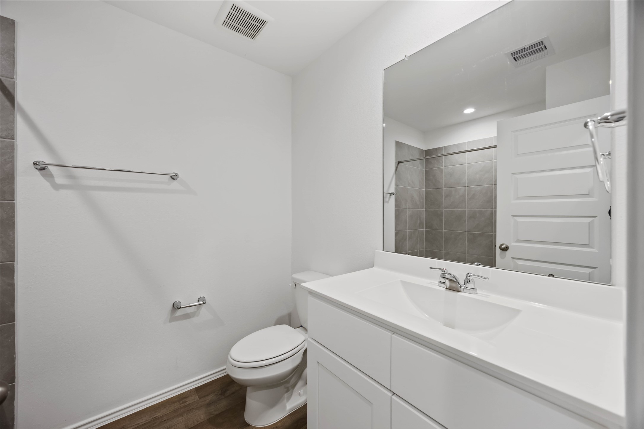 3719 Lanercost Lane Fulshear, TX 77441 - Photo 18 of 43 a bathroom with a sink toilet and shower