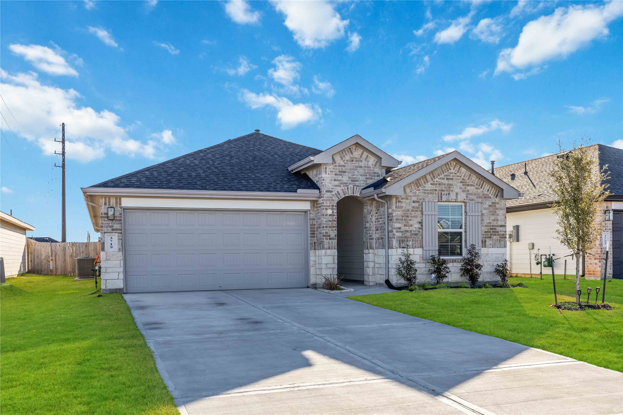 3719 Lanercost Lane Fulshear, TX 77441 - Photo 2 of 43 a front view of house with yard and green space