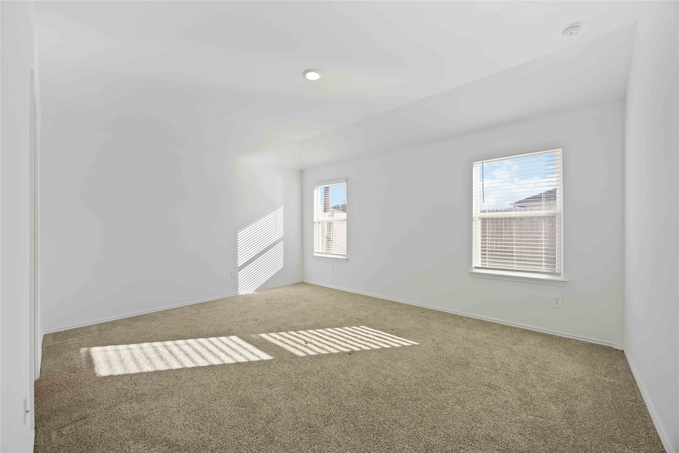 3719 Lanercost Lane Fulshear, TX 77441 - Photo 25 of 43 a view of an empty room with a window