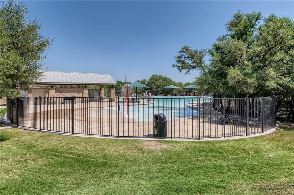 3822 Remington Road Cedar Park, TX 78613 - Photo 27 of 31 a backyard of a house with plants and large tree