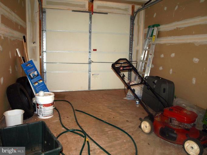 46182 Chester Terrace Sterling, VA 20165 - Photo 5 of 25 a bathroom with a sink mirror vanity and toilet