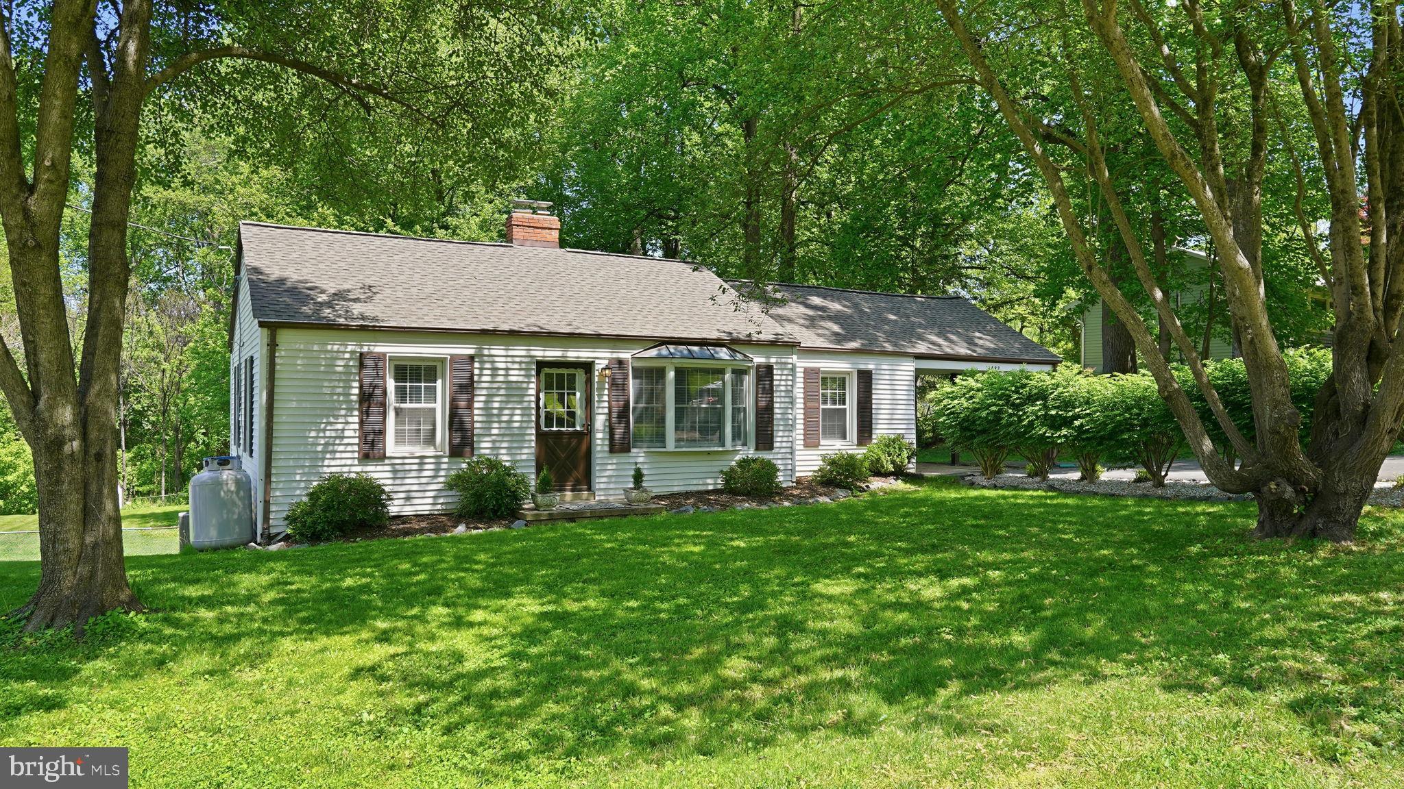 6499 Briggs Road Warrenton, VA 20187 - Photo 3 of 29 a view of a house with a yard and green space