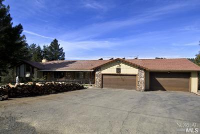 5160 Sharp Road Calistoga, CA 94515 - Photo 2 of 9 a front view of a house with a yard