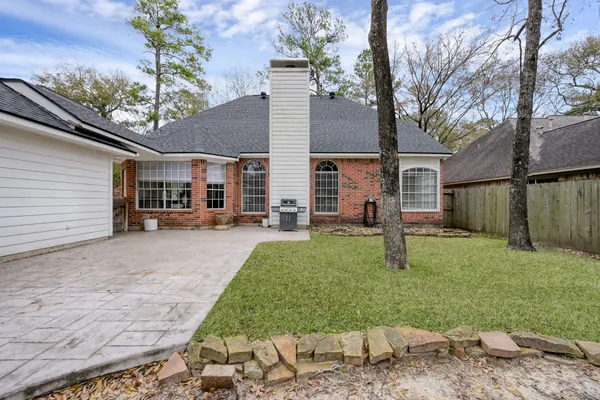 an aerial view of a sign board and yard