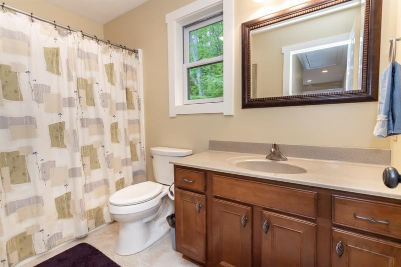 2226 County Line Road Champion, PA 15622 - Photo 25 of 33 a bathroom with a toilet sink and mirror