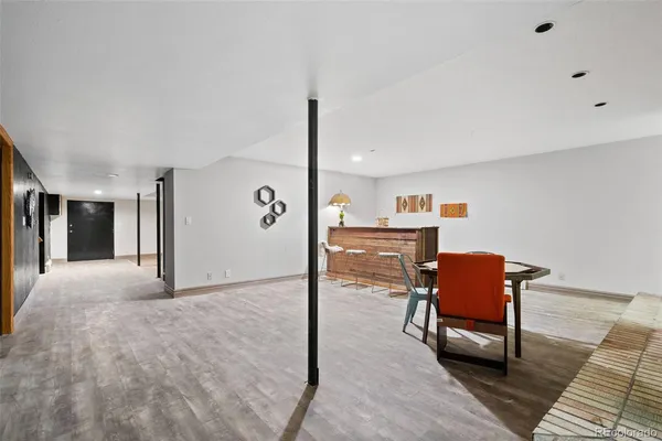 a workspace with furniture and window