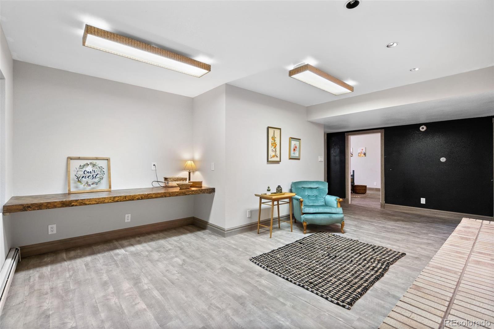 13231 Dillon Street Brighton, CO 80601 - Photo 36 of 49 a spacious bedroom with a bed and a window