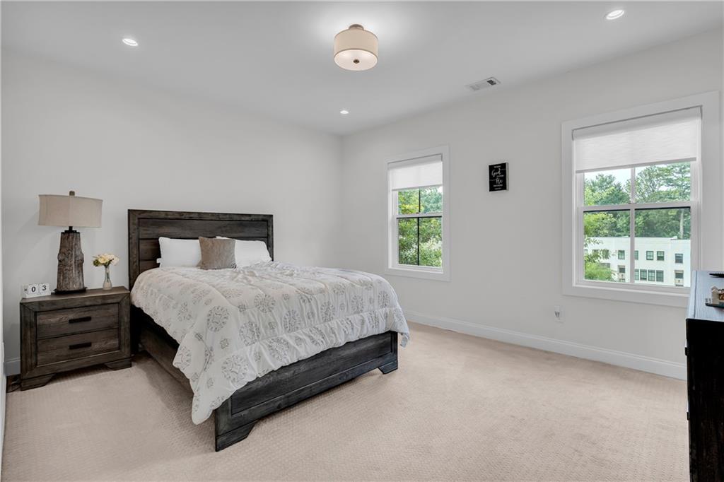 1141 Druid Fields Court Decatur, GA 30033 - Photo 16 of 35 a bedroom with a bed and a window