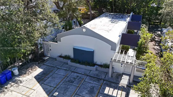 a front view of house and yard with green space