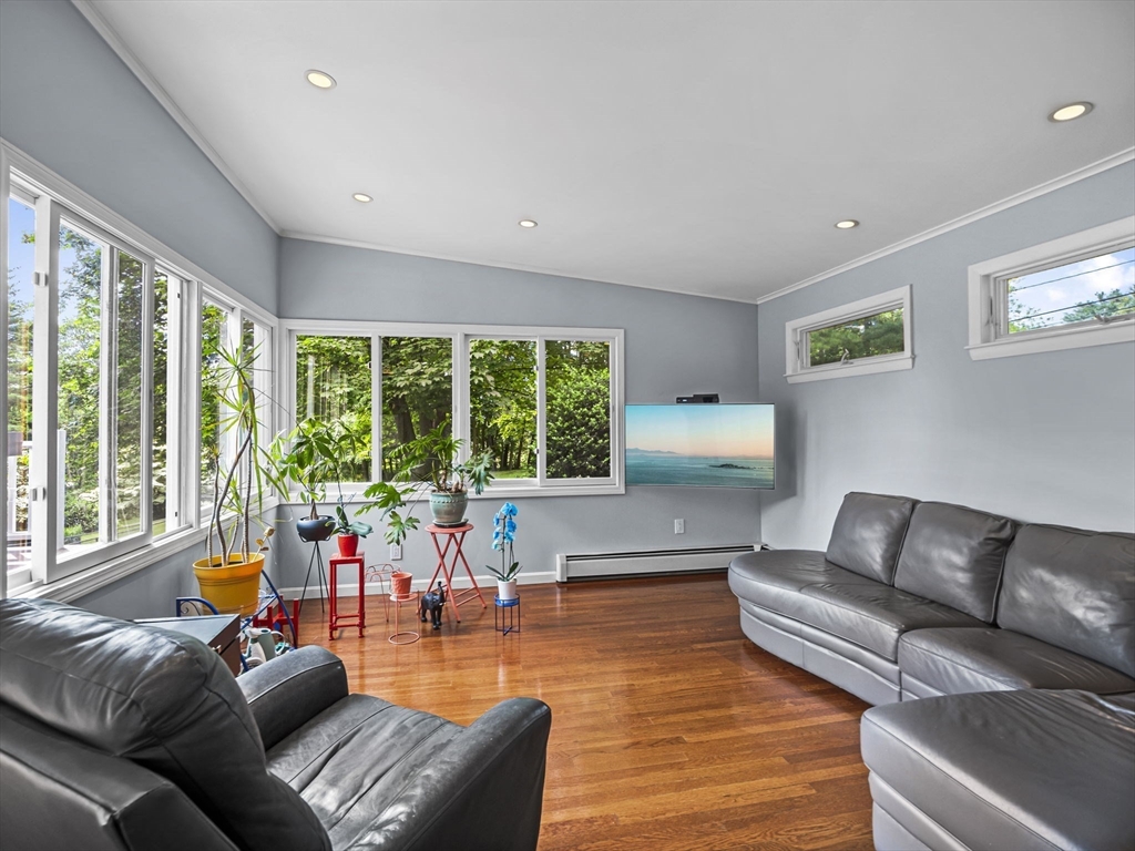 44 Locust Street Merrimac, MA 01860 - Photo 12 of 42 a living room with furniture and a large window