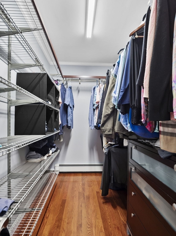44 Locust Street Merrimac, MA 01860 - Photo 22 of 42 a view of walk in closet with clothes and shoes