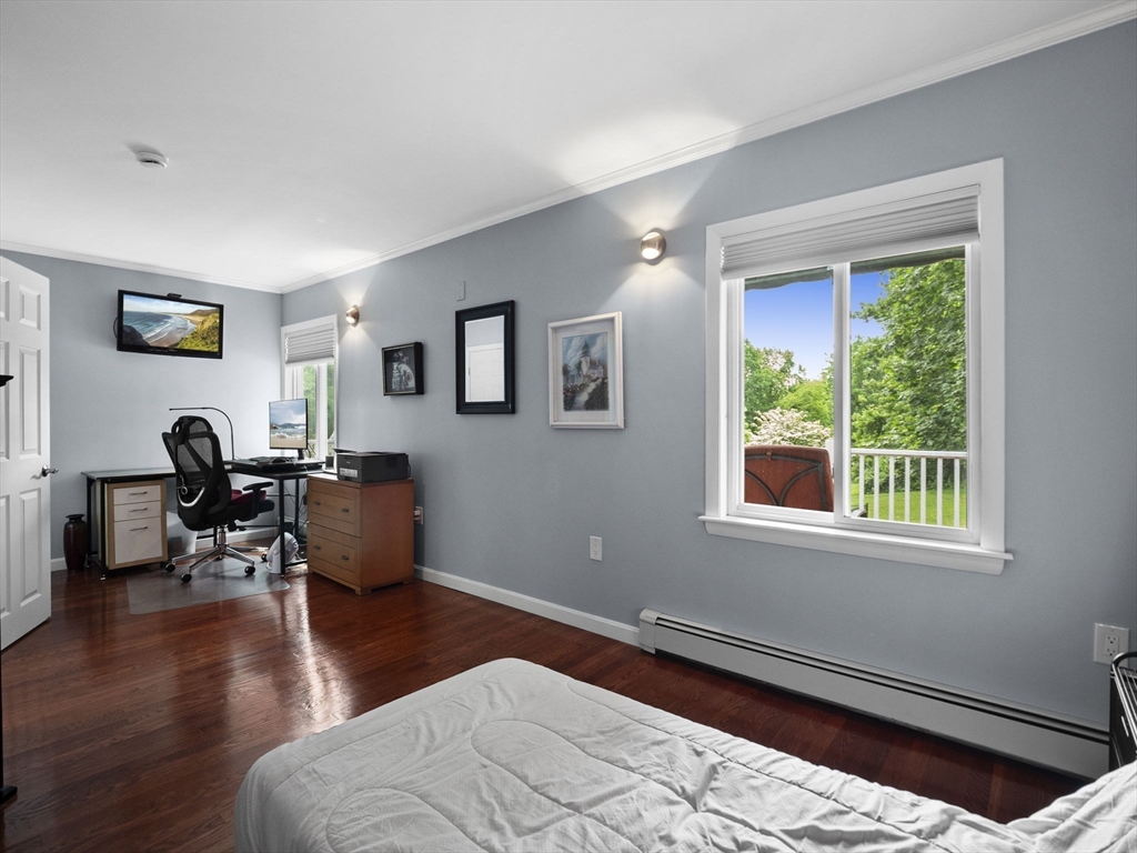 44 Locust Street Merrimac, MA 01860 - Photo 24 of 42 a bedroom with furniture window and wooden floor