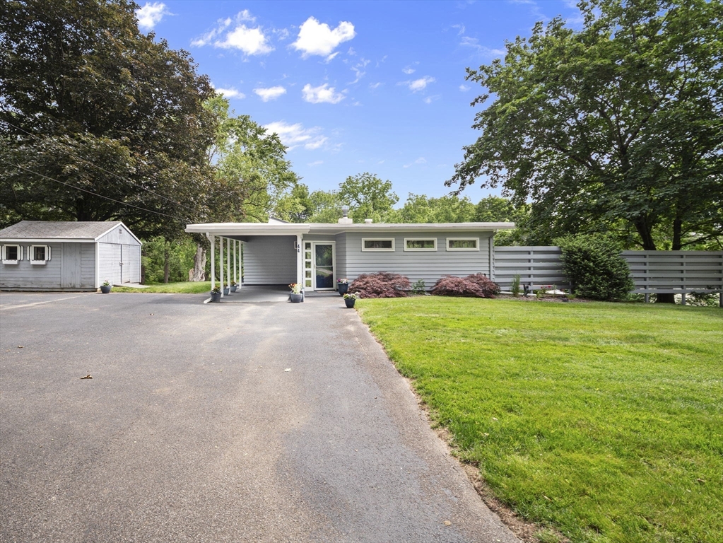 44 Locust Street Merrimac, MA 01860 - Photo 3 of 42 a front view of house with yard and green space