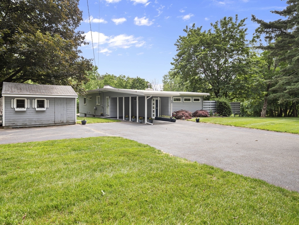 44 Locust Street Merrimac, MA 01860 - Photo 4 of 42 a view of house with yard and swimming pool