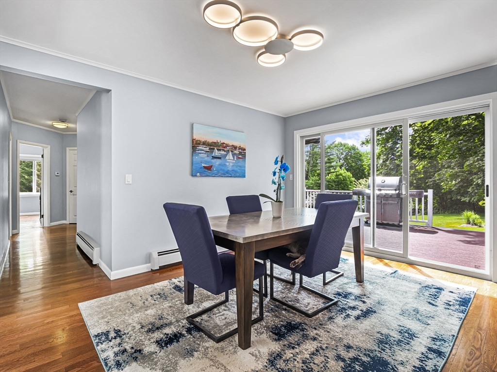 44 Locust Street Merrimac, MA 01860 - Photo 8 of 42 a view of a dining room with furniture window and wooden floor