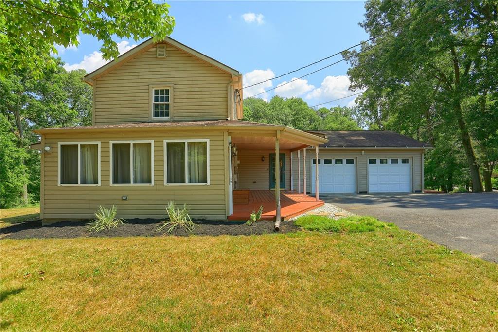 1261 Highway 989 Rochester, PA 15074 - Photo 2 of 25 Wonderful large windows and notice the large parking area for your guests.