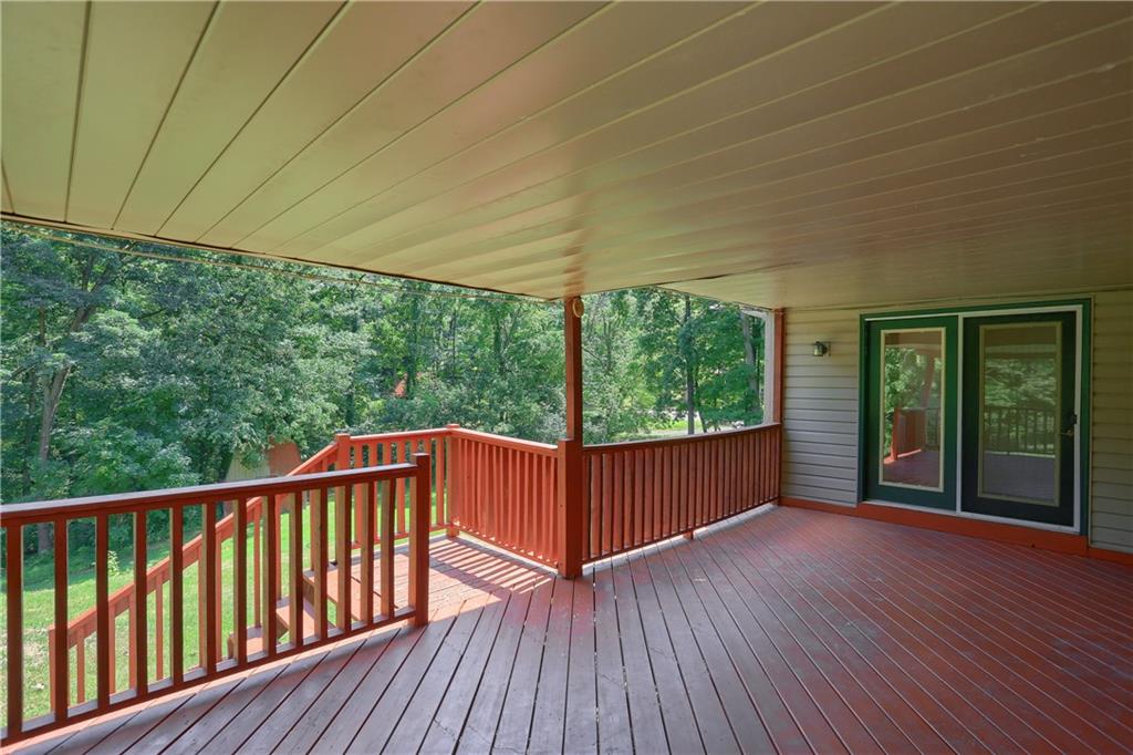 1261 Highway 989 Rochester, PA 15074 - Photo 21 of 25 Large rear porch off the dining room, kitchen and access from the 1st floor master