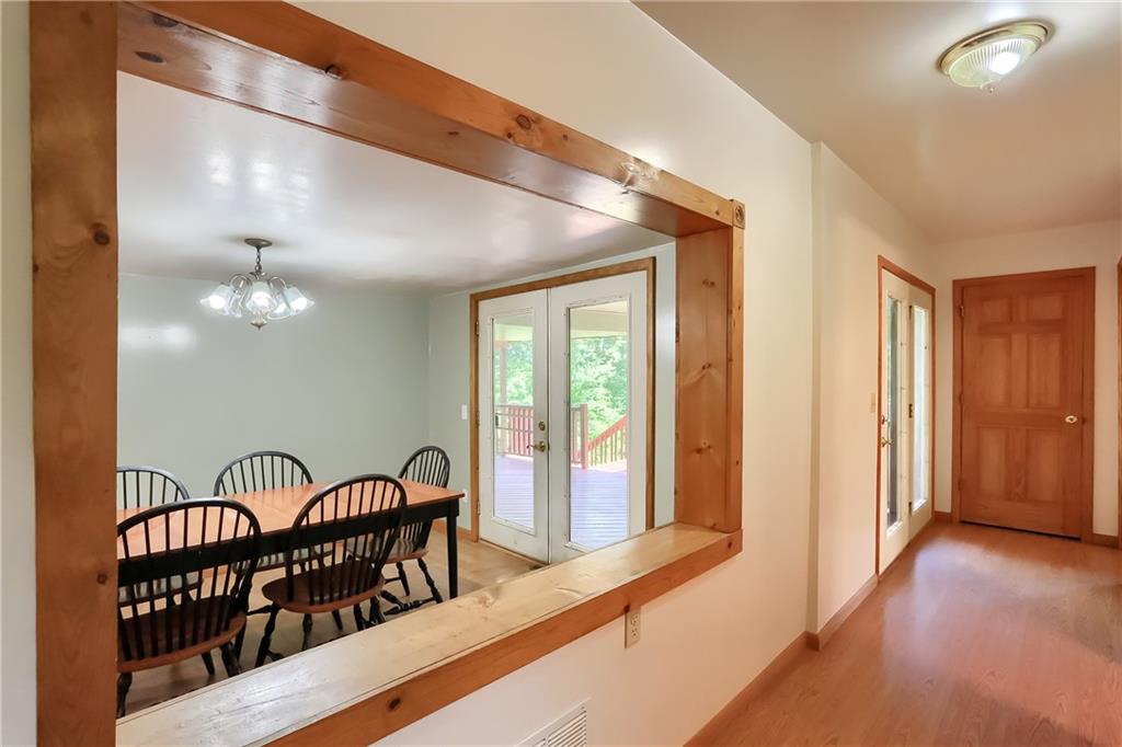 1261 Highway 989 Rochester, PA 15074 - Photo 5 of 25 Beautiful picture window to open everything up. French doors to bring the outside in. Great natural lighting!