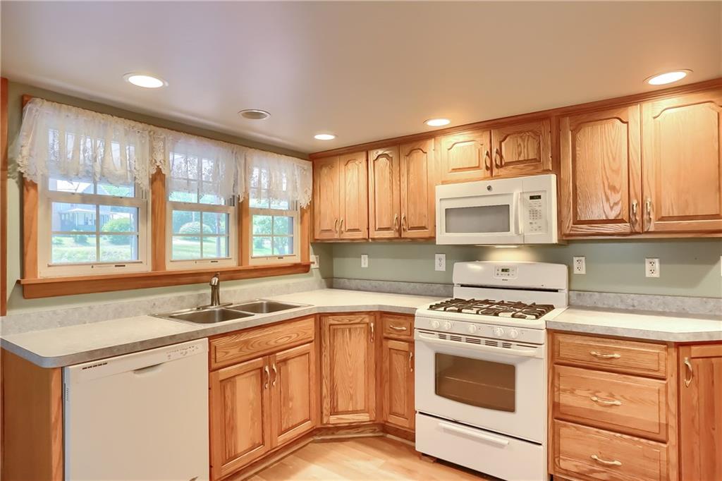 1261 Highway 989 Rochester, PA 15074 - Photo 6 of 25 Cooking is easy in this beautiful U shaped kitchen. Lots of room with no one bumping into each other. Notice the large pull out drawers.
