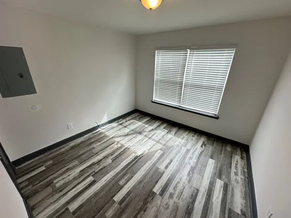 a bathroom with a toilet and a bathtub