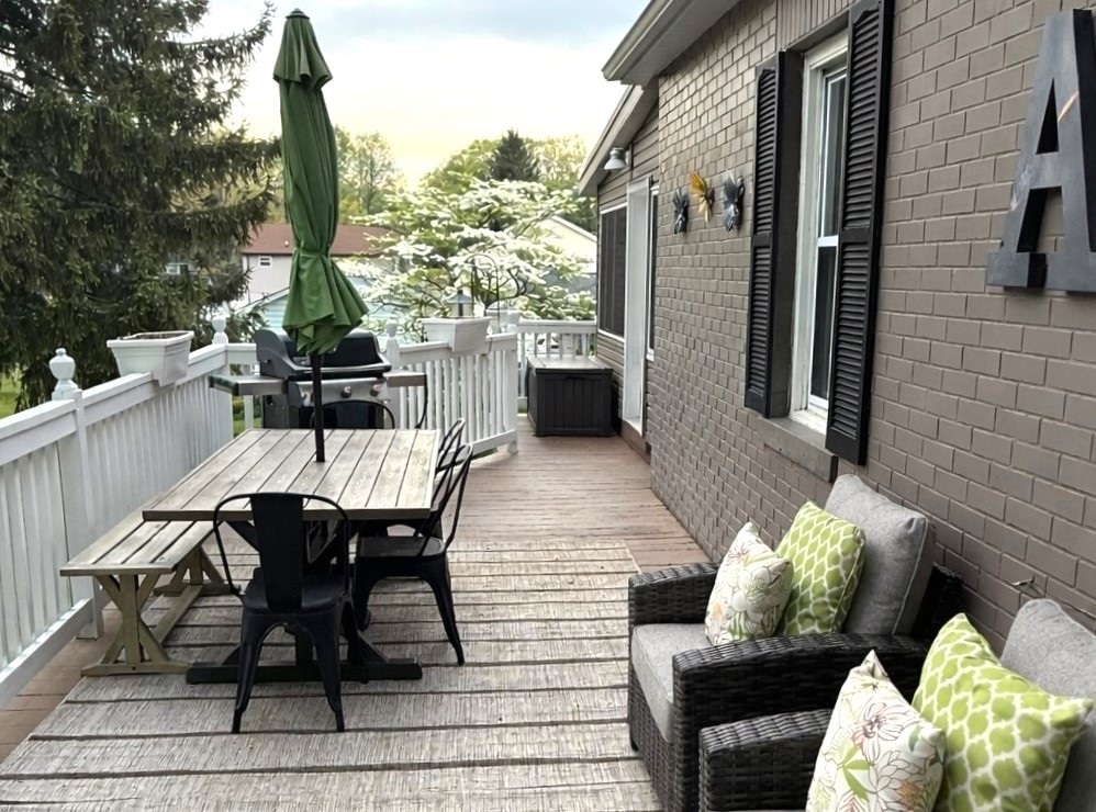 5038 Exeter Road Erie, PA 16509 - Photo 29 of 35 AMAZING DECK, SPANNING THE FULL LENGTH OF THE HOME
