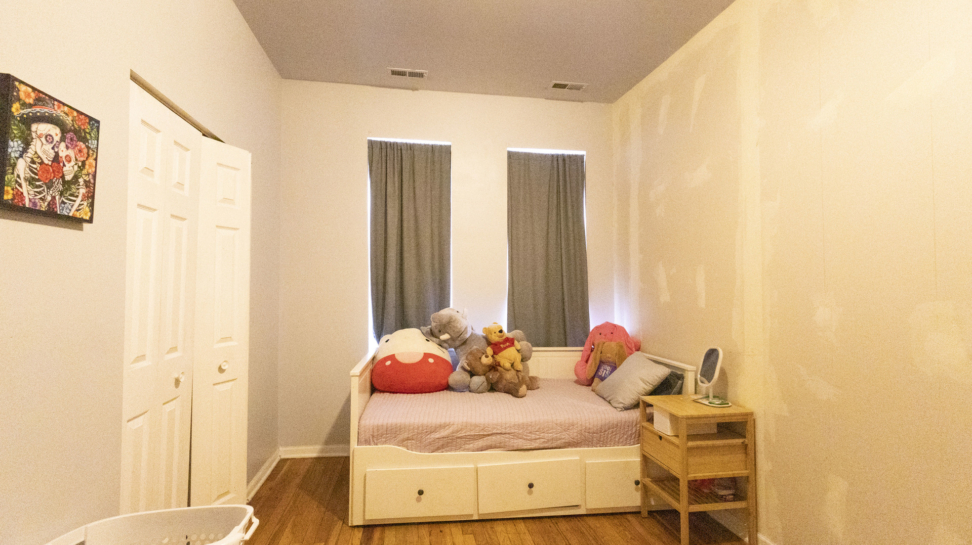 3612 West Roosevelt Road Chicago, IL 60624 - Photo 13 of 32 a bedroom with a bed and a window