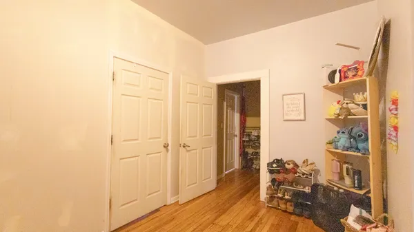a view of a livingroom with wooden floor