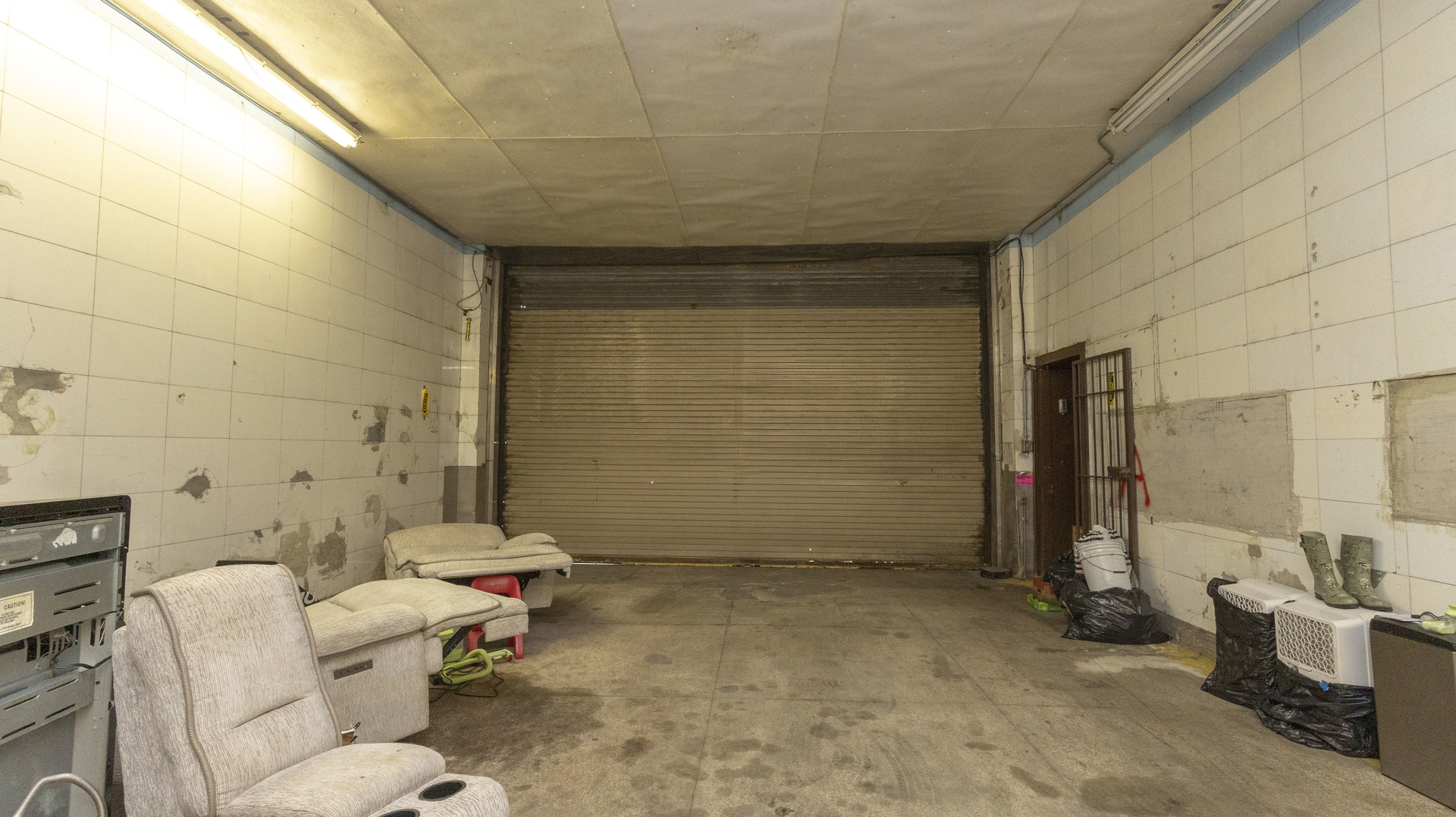 3612 West Roosevelt Road Chicago, IL 60624 - Photo 26 of 32 a bathroom with a toilet and a shower
