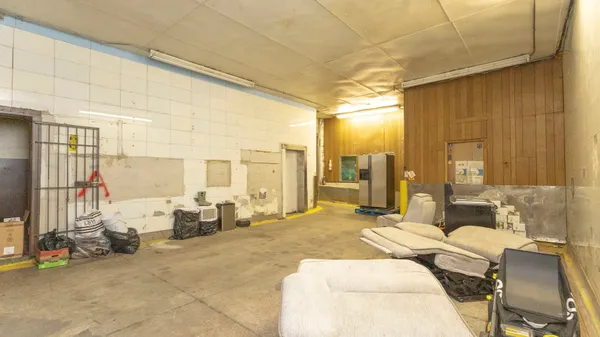 a bed room with a bed and a couch