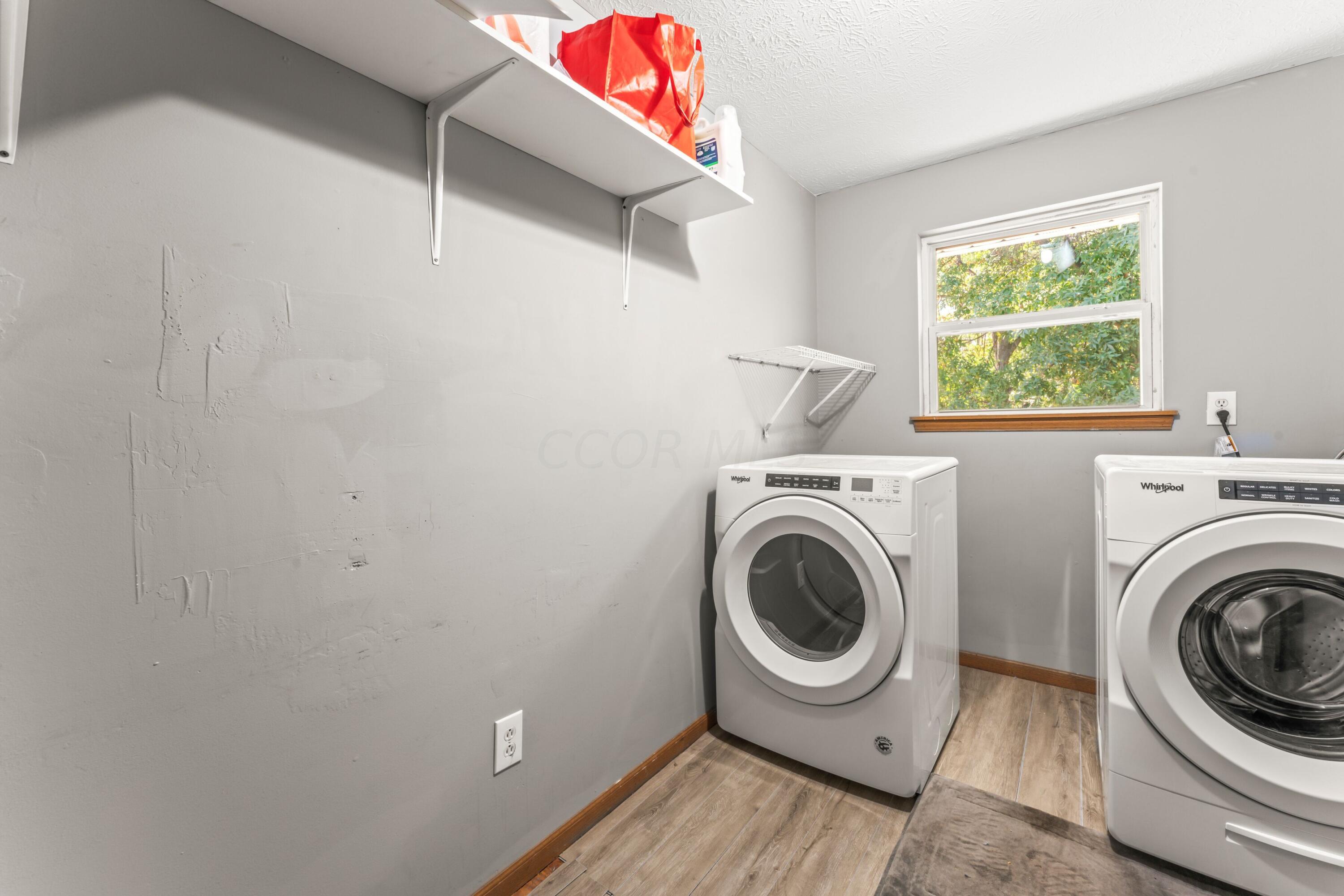 443 South Waggoner Road Reynoldsburg, OH 43068 - Photo 16 of 42 SPACIOUS FIRST FLOOR LAUNDRY ROOM