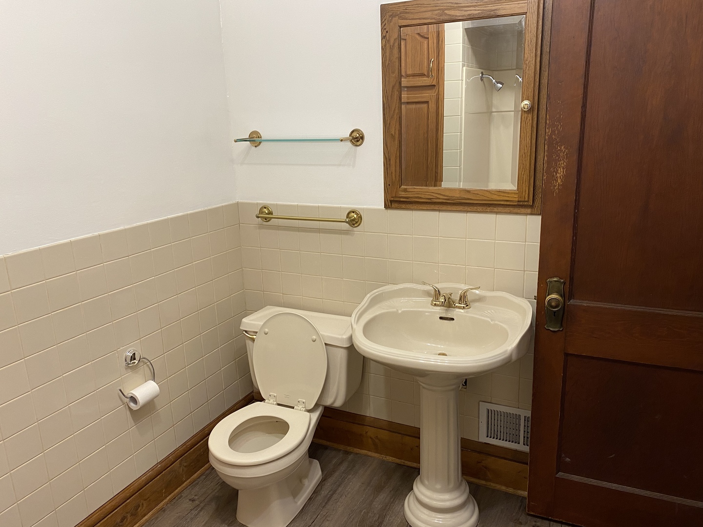 22 Payne Place Normal, IL 61761 - Photo 16 of 26 a bathroom with a toilet sink and mirror