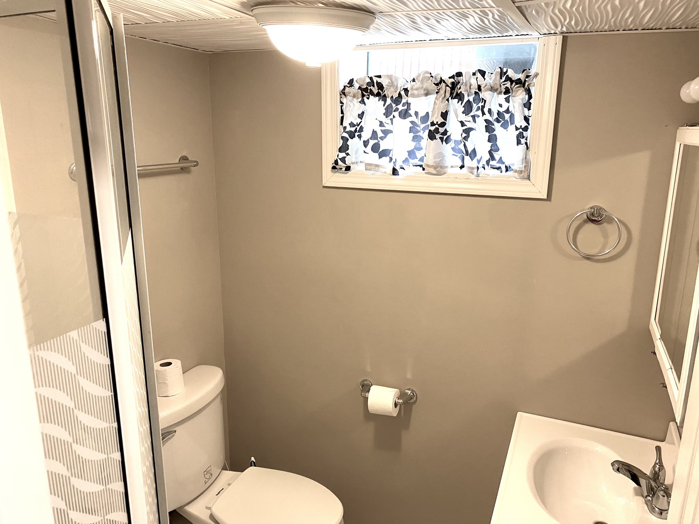 22 Payne Place Normal, IL 61761 - Photo 23 of 26 a white toilet sitting next to a small bathroom