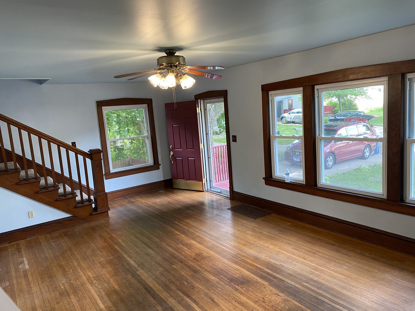 22 Payne Place Normal, IL 61761 - Photo 3 of 26 a view of an empty room with wooden floor and a window