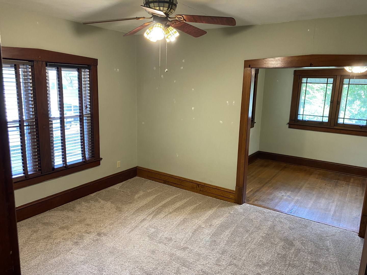 22 Payne Place Normal, IL 61761 - Photo 10 of 26 a view of an empty room with a window and wooden floor