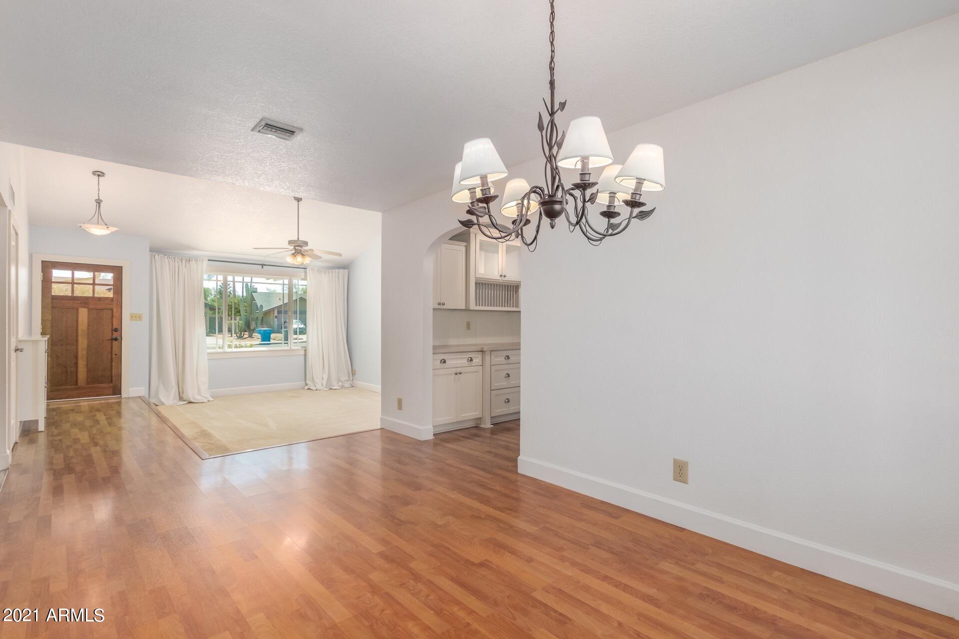 4218 East Redfield Road Phoenix, AZ 85032 - Photo 6 of 20 Large windows bring the Arizona Sunshine